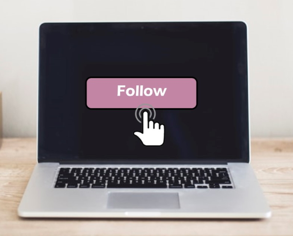 Mouse hovering over 'follow' button on laptop