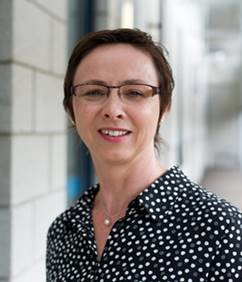 A woman, Beate Lichtwardt, smiling and looking into the camera