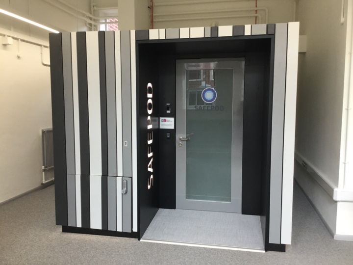 Image on a SafePod, a secure room inside a building, with a door inside providing a safe setting to access sensitive data 