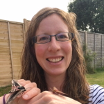 Sarah Knight (Data Impact Fellow) with moths