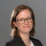 A headshot photograph of Emma Bridger